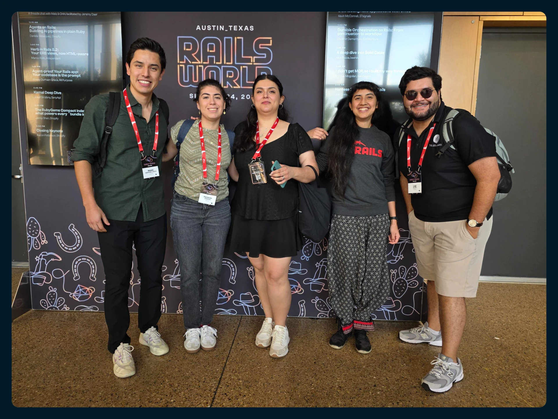 The five of us from Telos Labs in front of the Rails World 2026 sign in Austin, Texas.